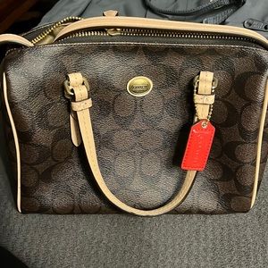 Signature Coach crossbody purse
